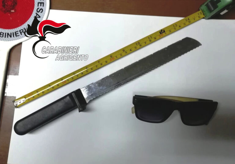 Rapina ribera coltello e occhiali da sole