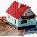 Tasse sulla casa, ICI, IMU - immagini simboliche. Imposta Municipale Unica. Case e banconote